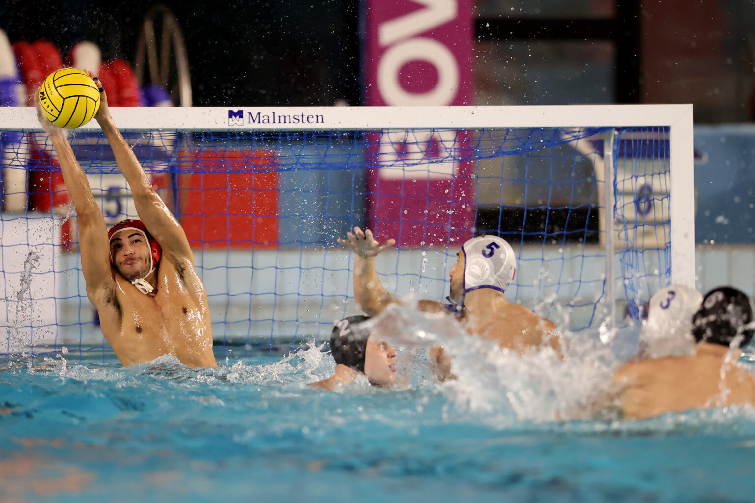 IMAGO / Domenic Aquilina, Malta national team water polo goalkeeper Jake Tanti dives to his right to parry the ball